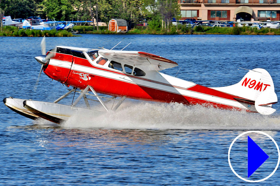 red coloured sea plane