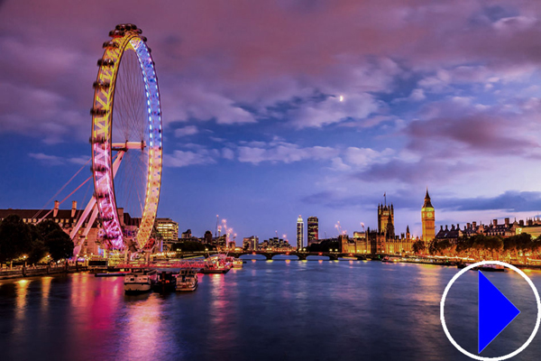view of the millenium wheel and river thames at twilight