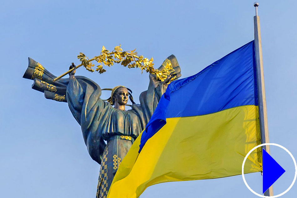 ukranian flag and statue
